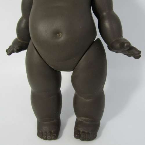 Pair of vintage African rubber dolls