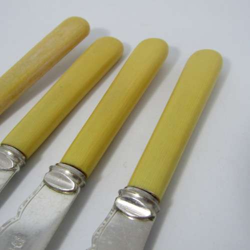 Lot of 4 vintage bone handle fish knives
