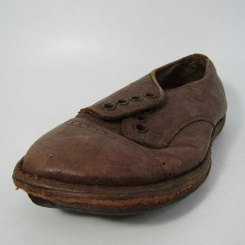 Pair of antique leather boys shoes