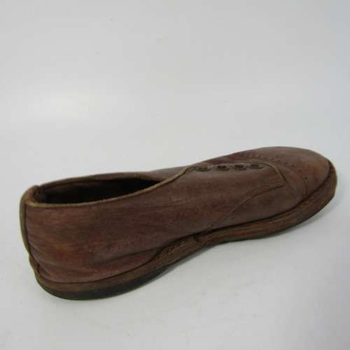 Pair of antique leather boys shoes