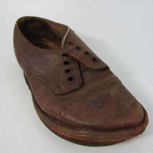 Pair of antique leather boys shoes