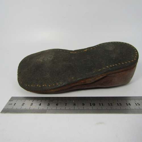Pair of antique leather boys shoes