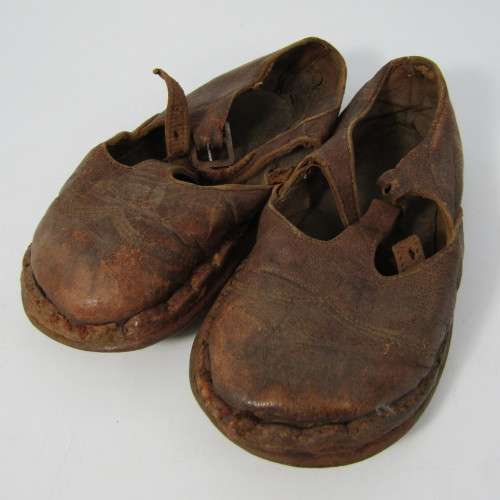 Pair of antique leather girl shoes