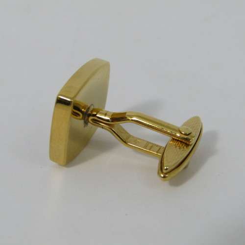 Pair of Dunhill gold plated cufflinks in original box