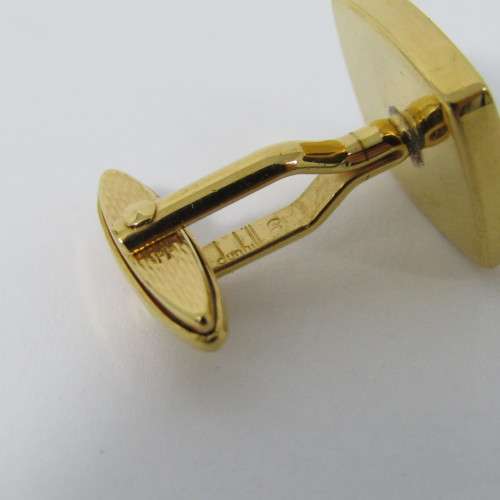 Pair of Dunhill gold plated cufflinks in original box