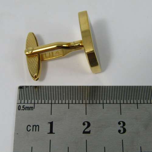 Pair of Dunhill gold plated cufflinks in original box