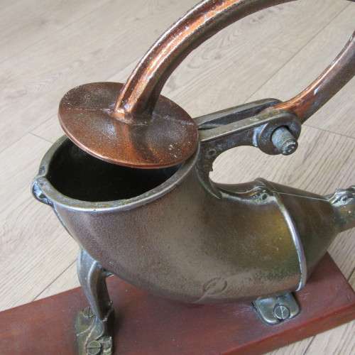 Vintage sausage press with spout