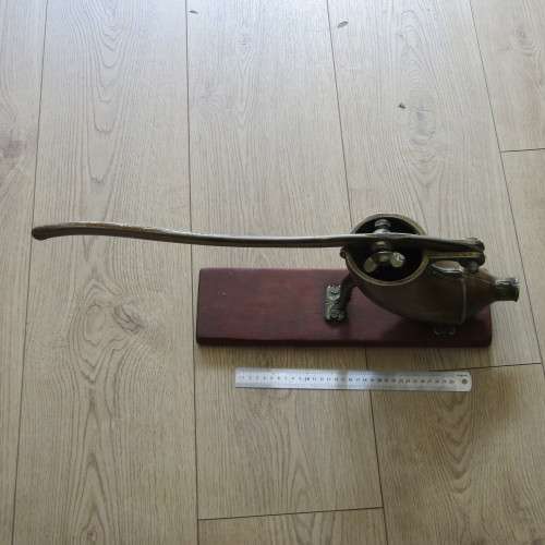 Vintage sausage press with spout