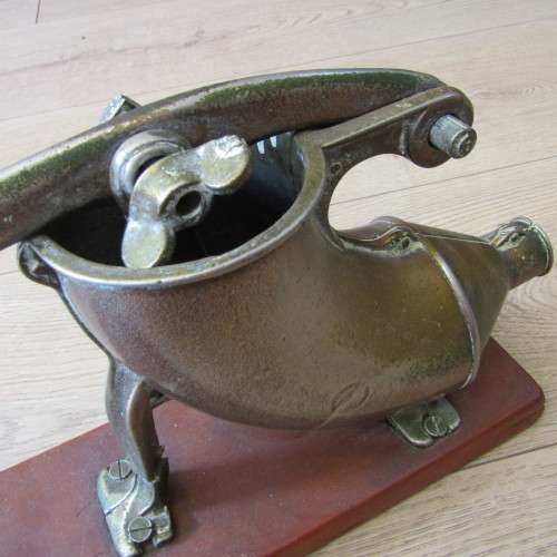 Vintage sausage press with spout