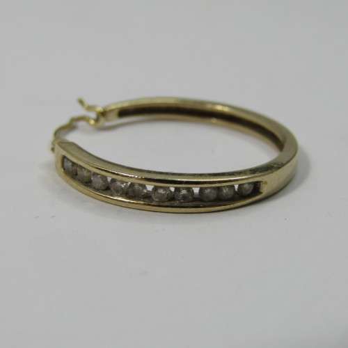 Pair of 9kt Yellow Gold earrings with small Diamonds - weighs 3,9g