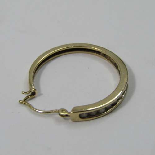 Pair of 9kt Yellow Gold earrings with small Diamonds - weighs 3,9g