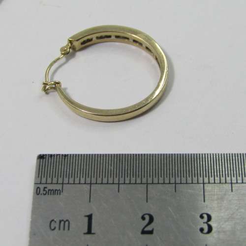 Pair of 9kt Yellow Gold earrings with small Diamonds - weighs 3,9g
