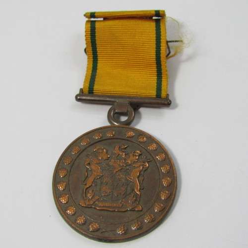 SA Prison Service Faithfull service medal issued to 15425-C Lt. EA de Brauwere with miniature