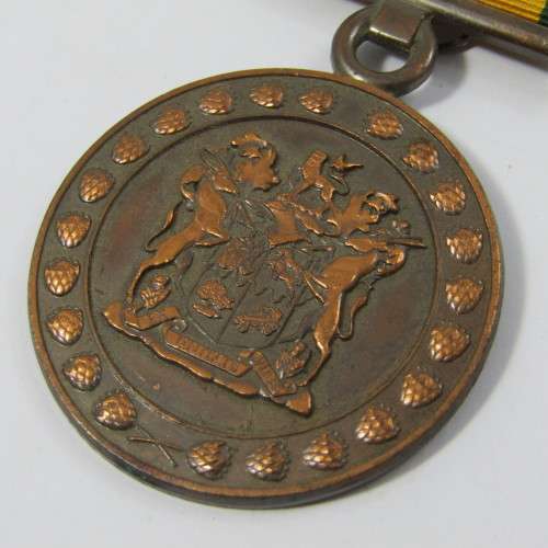 SA Prison Service Faithfull service medal issued to 15425-C Lt. EA de Brauwere with miniature