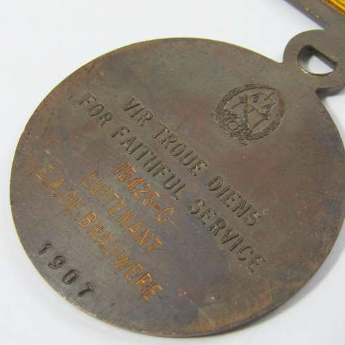 SA Prison Service Faithfull service medal issued to 15425-C Lt. EA de Brauwere with miniature