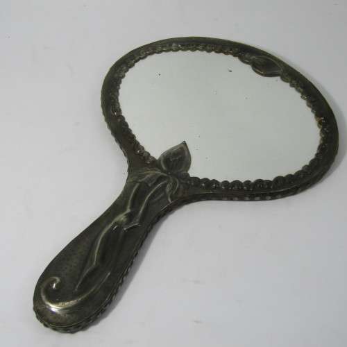 Antique  Pewter hand mirror with flower patterns