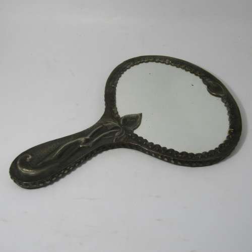 Antique  Pewter hand mirror with flower patterns