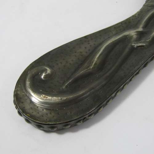 Antique  Pewter hand mirror with flower patterns