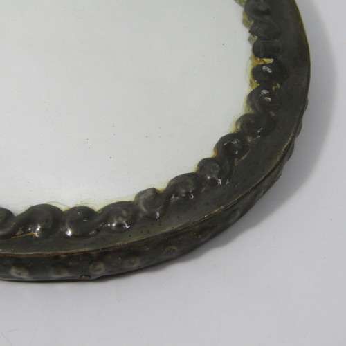 Antique  Pewter hand mirror with flower patterns