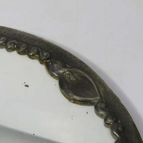 Antique  Pewter hand mirror with flower patterns