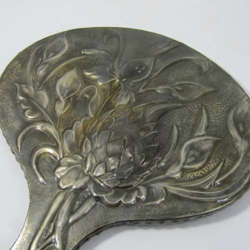 Antique  Pewter hand mirror with flower patterns