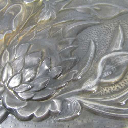 Antique  Pewter hand mirror with flower patterns