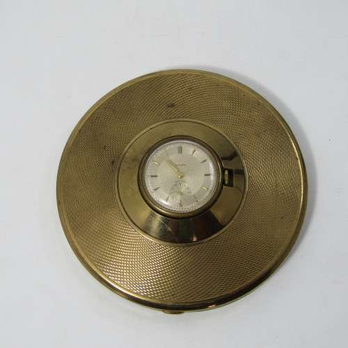 Vintage Gold coloured powder compact with manual wind watch in lid