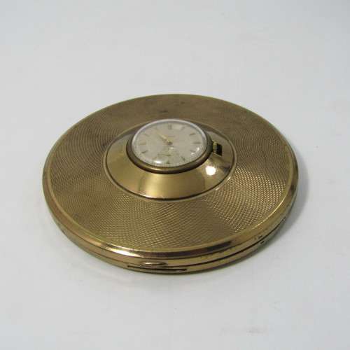 Vintage Gold coloured powder compact with manual wind watch in lid