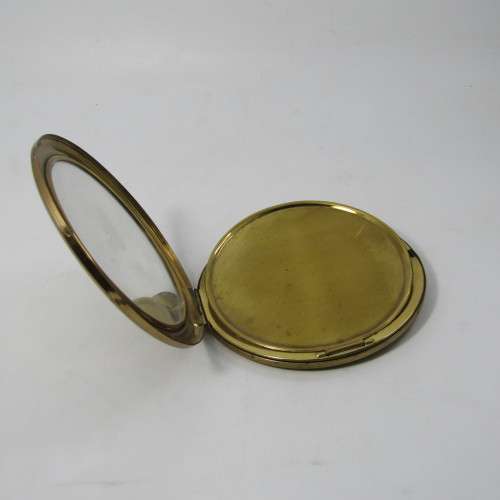 Vintage Gold coloured powder compact with manual wind watch in lid