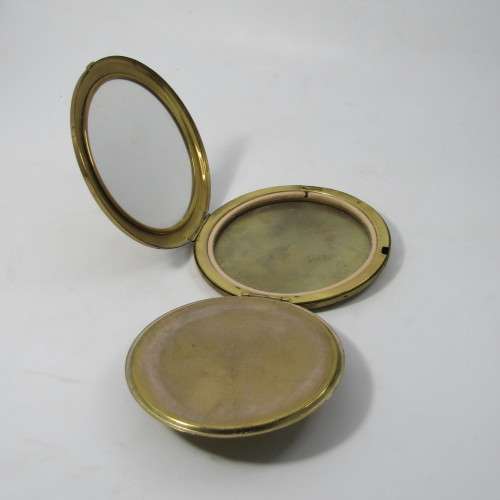 Vintage Gold coloured powder compact with manual wind watch in lid