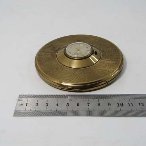Vintage Gold coloured powder compact with manual wind watch in lid