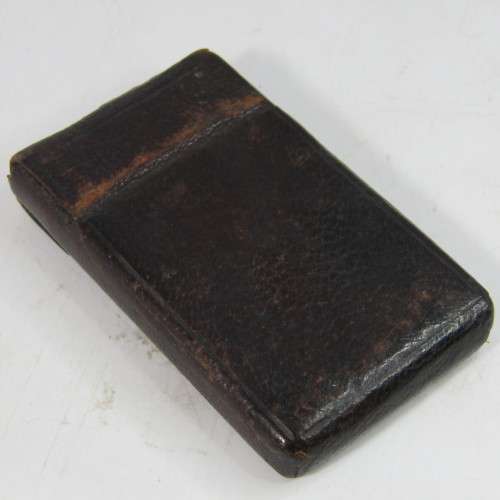 Set of 5 Antique Bruss aperture slides in leather case