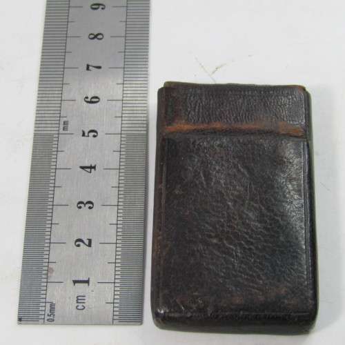 Set of 5 Antique Bruss aperture slides in leather case