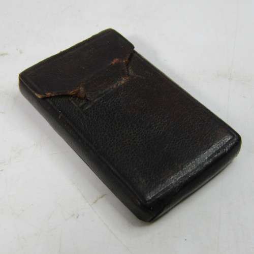 Set of 5 Antique Bruss aperture slides in leather case