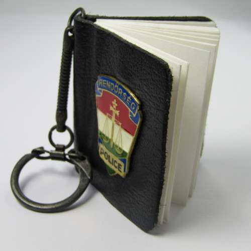 Hungarian Police badge and key chain booklet