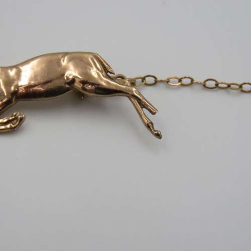 9kt Gold Springbok brooch with safety chain - weighs 3.6 grams