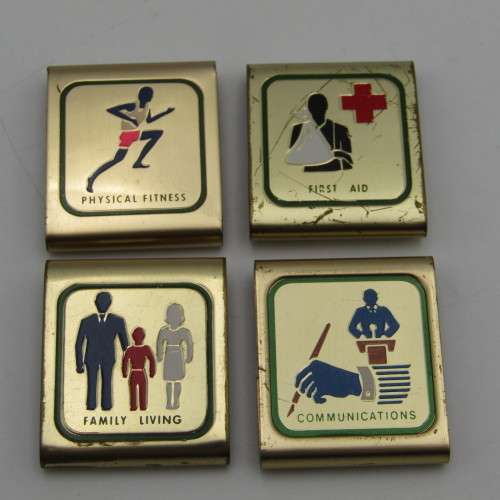 Lot of 4 Boy scout metal belt badges