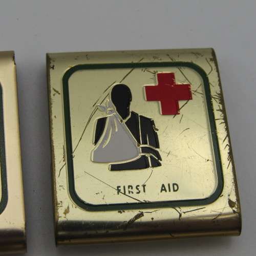 Lot of 4 Boy scout metal belt badges