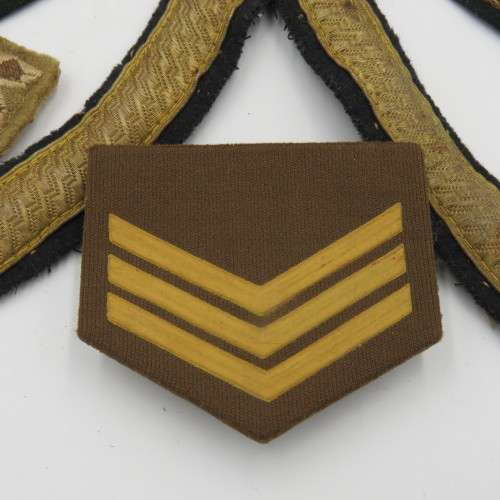 Large lot of military rank badges