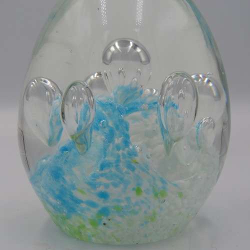 Handmade glass paperweight with bubbles design