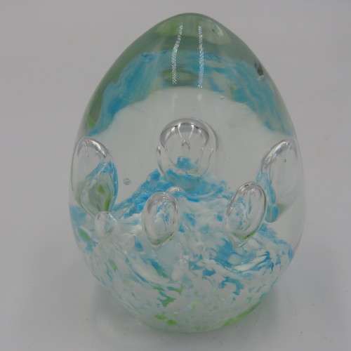 Handmade glass paperweight with bubbles design