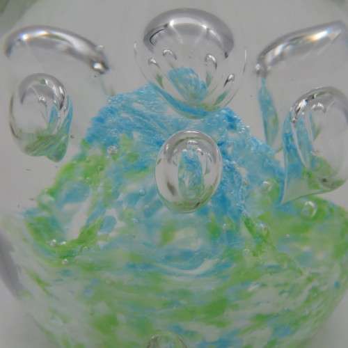 Handmade glass paperweight with bubbles design