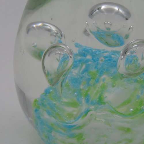 Handmade glass paperweight with bubbles design