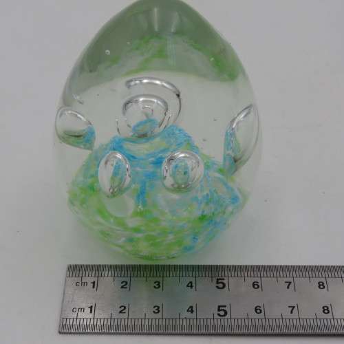 Handmade glass paperweight with bubbles design