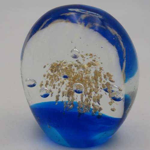 Handmade glass paperweight with bubbles design