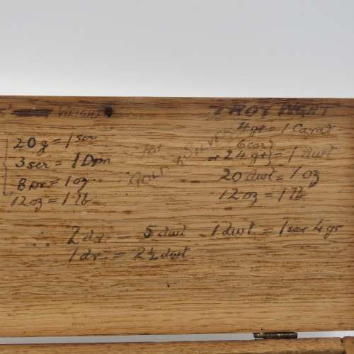Antique pocket balancing scale with weights