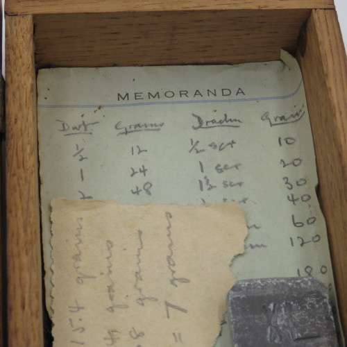 Antique pocket balancing scale with weights