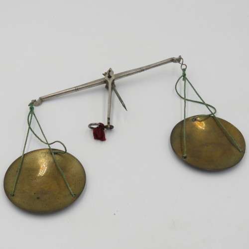 Antique pocket balancing scale with weights