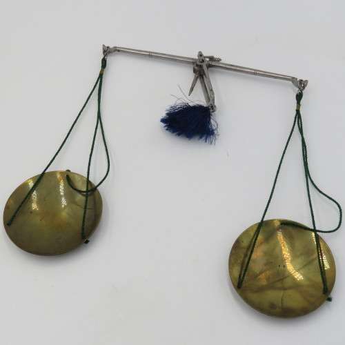 Antique pocket balancing scale