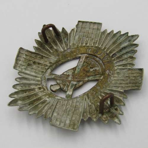 The Royal Scoots cap badge